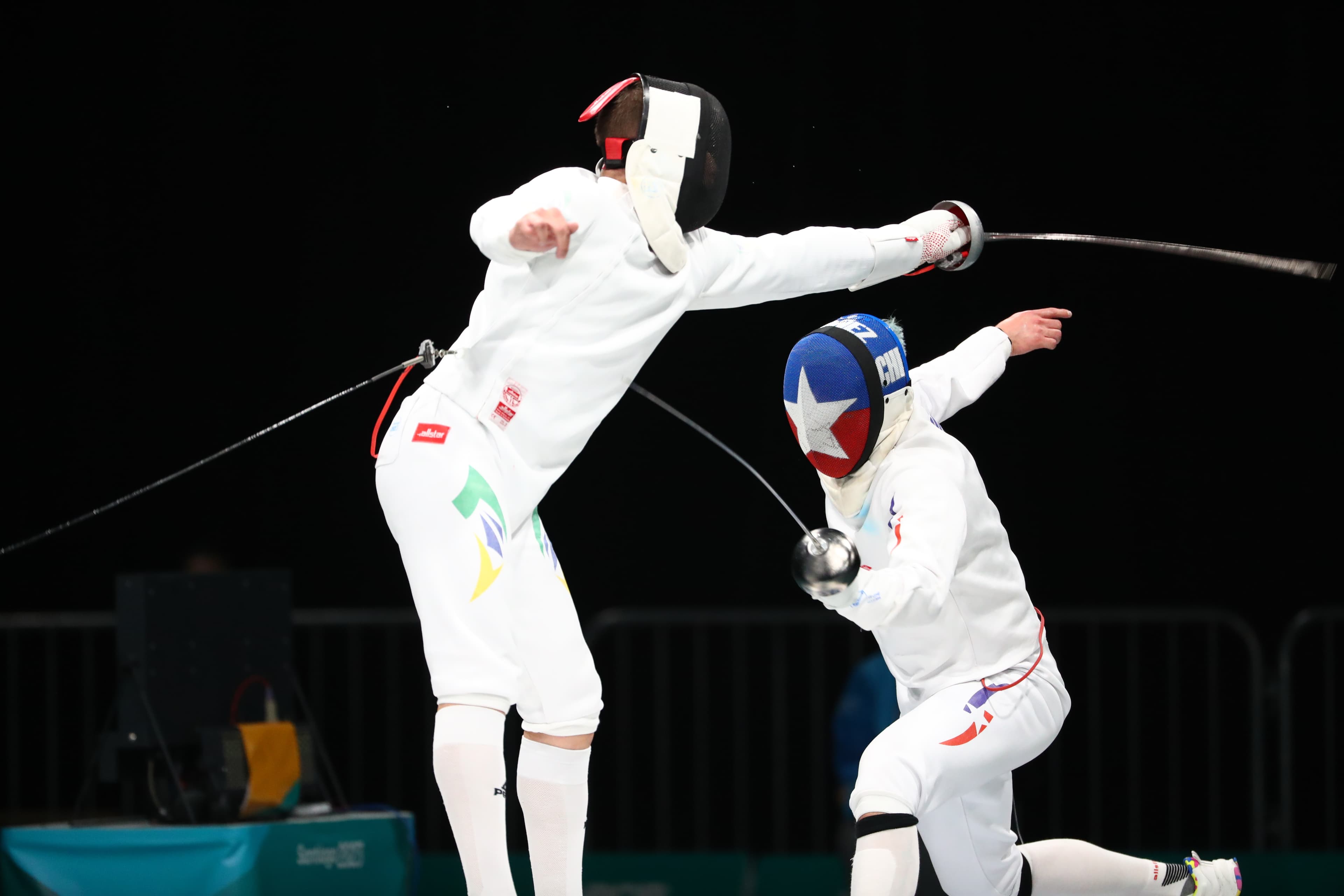 Epee fencers in a competition exchange