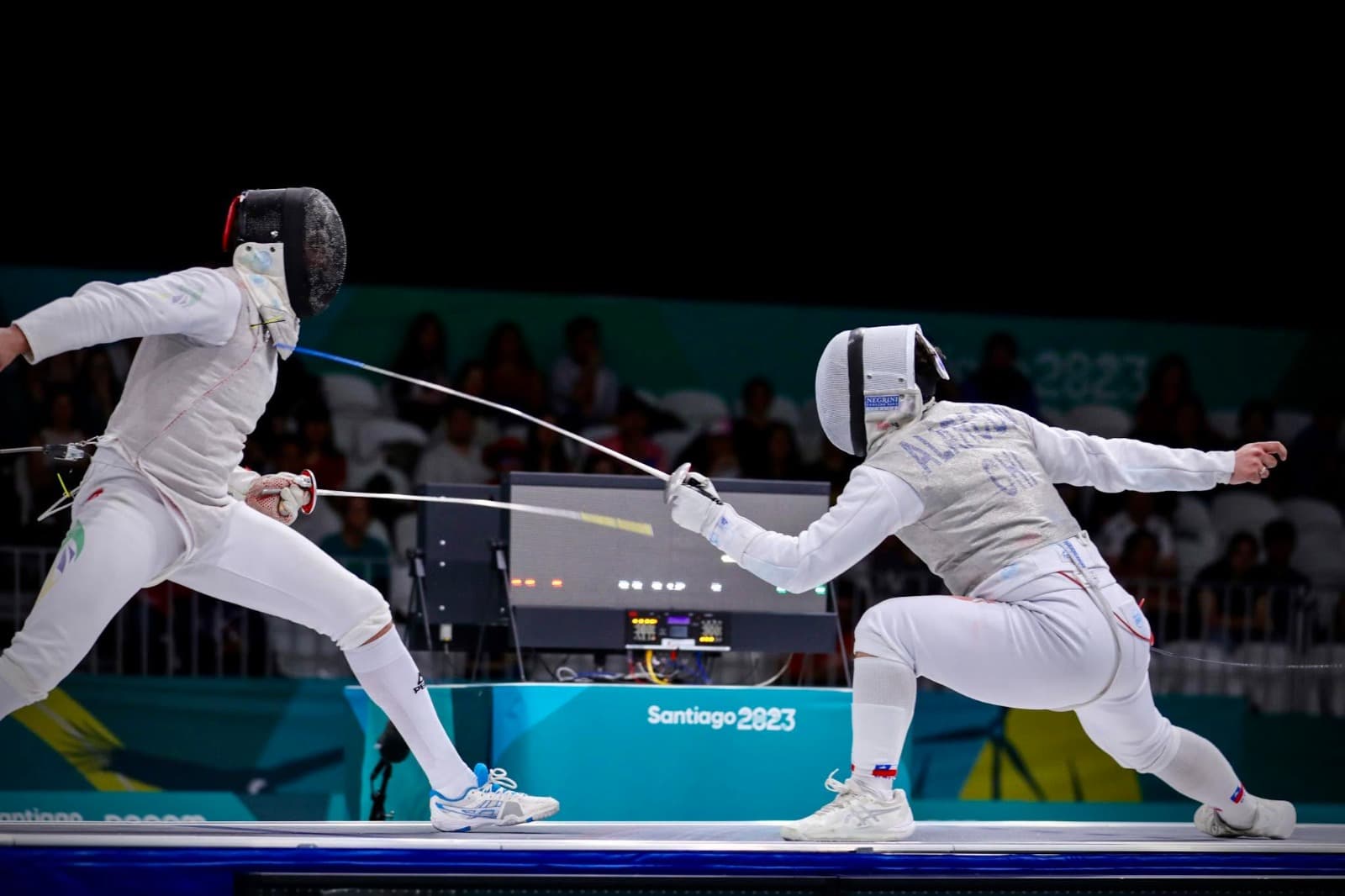 Foil fencers in a competition exchange